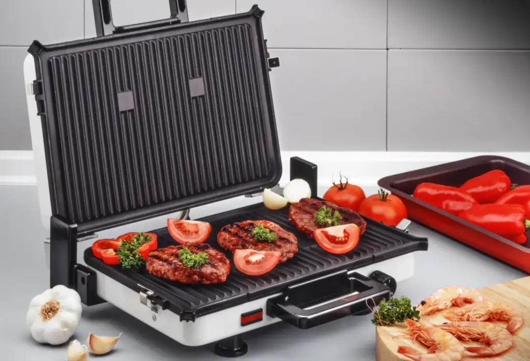 Grill elektryczny opiekacz – idealne rozwiązanie dla smakoszy i oszczędności czasu