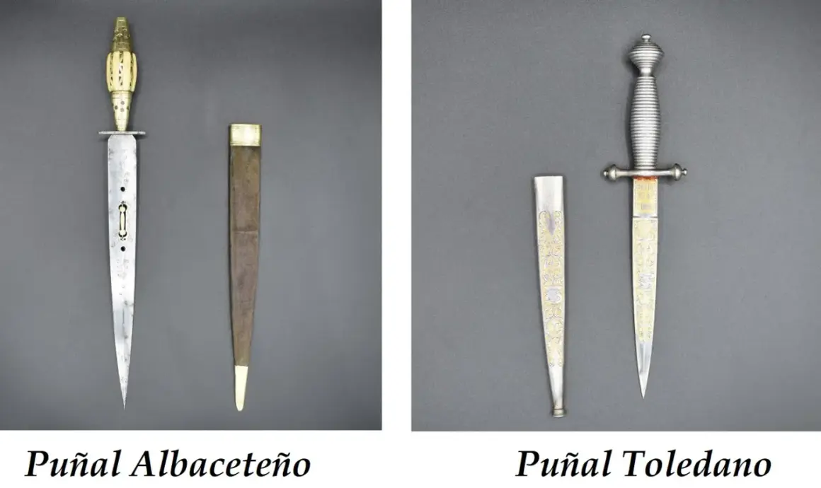 Dos puñales, uno Albaceteño con mango de hueso y otro Toledano con grabados dorados, son armas históricas.