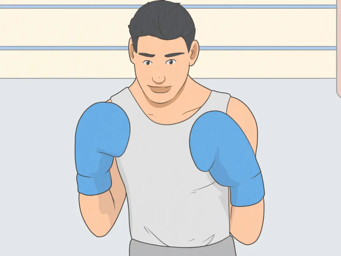 A boxer in blue gloves stands ready, his stance showing he's prepared to spare no effort in the ring.