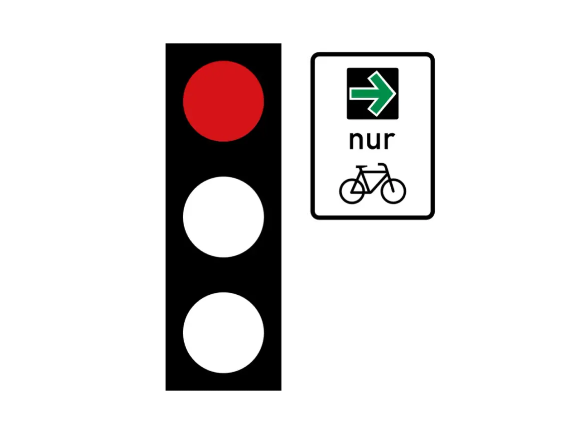 Rote Ampel zeigt Stopp an. Ein Schild mit Pfeil nach rechts und Fahrradsymbol bedeutet: Nur Radfahrer dürfen hier weiterfahren. Wer hat Vorfahrt?