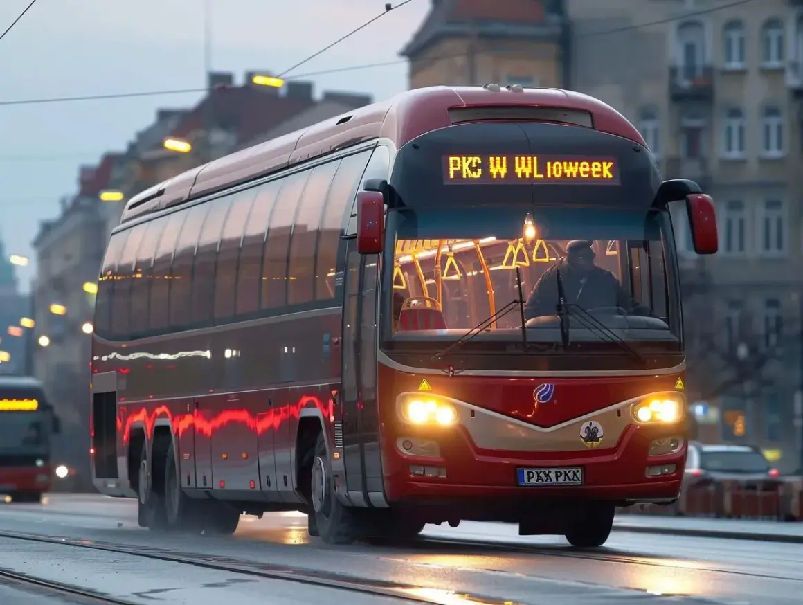 Czerwony autobus PKS jedzie ulicą. Zastanawiasz się, jaka jest pks bilet miesięczny cena?