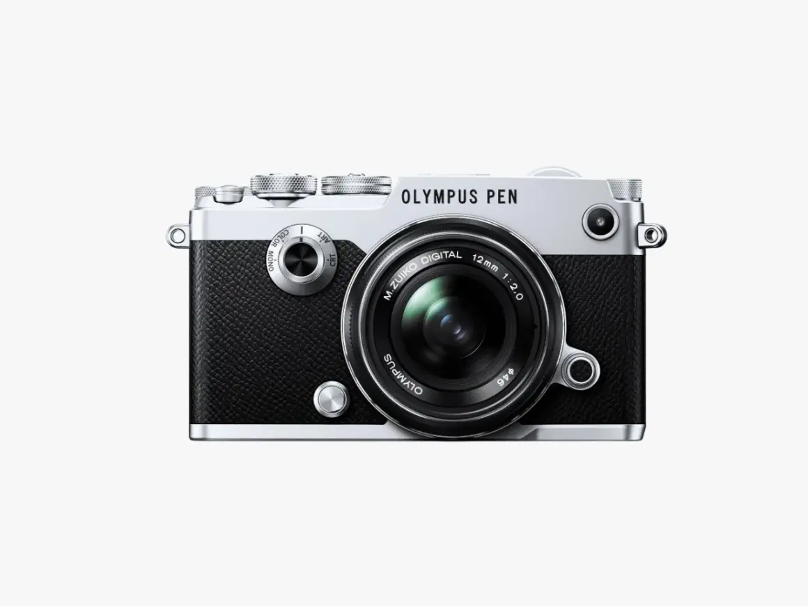 The Olympus PEN-F camera, a stylish blend of retro design and modern technology, ready to capture your next masterpiece.