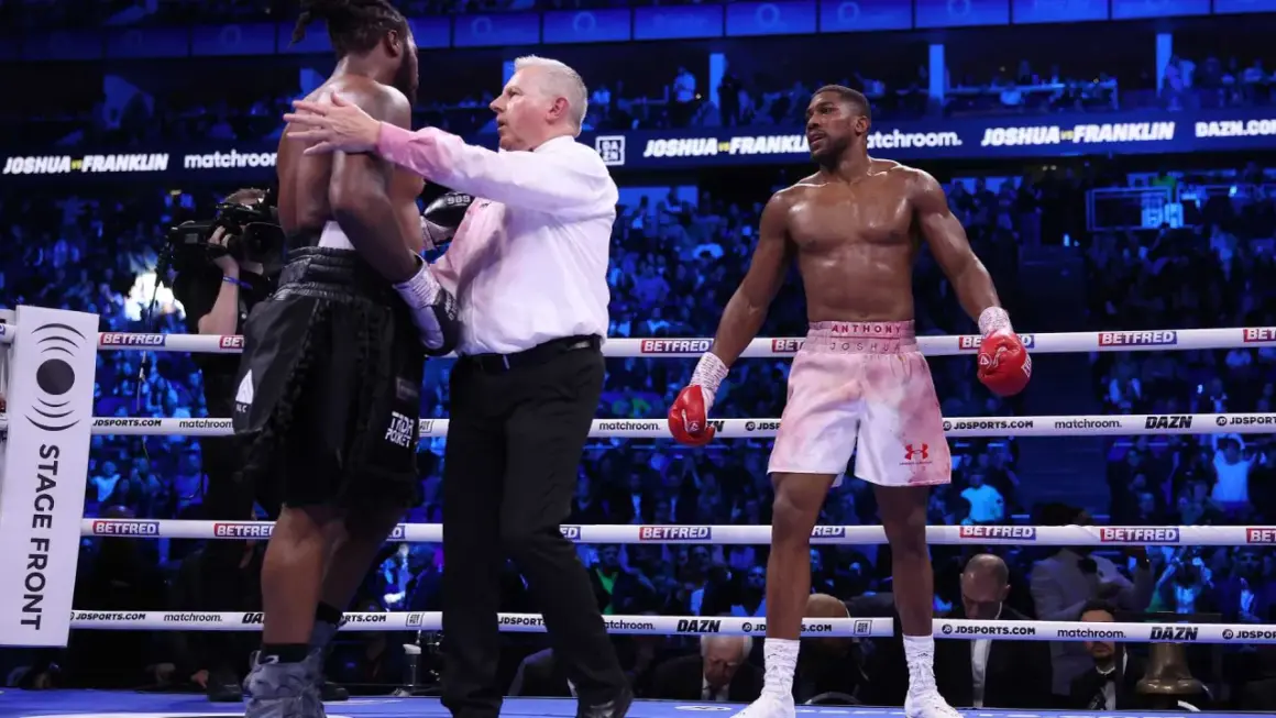 Referee separates boxers Anthony Joshua and Dillian Whyte. Judges score boxing matches based on punches landed, defense, and ring control.