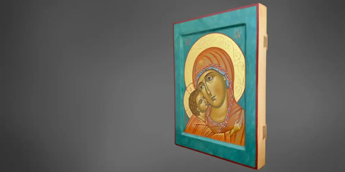 Ikony Matki Boskiej prawosławne: wzruszający obraz przedstawiający Maryję z Dzieciątkiem Jezus, otoczonych złotym tłem i ozdobną ramą.