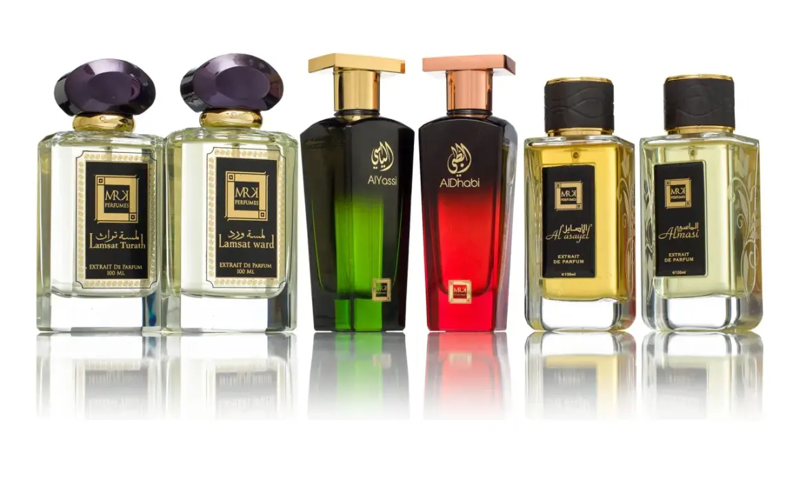 Kolekcja sześciu luksusowych perfum niszowych, każdy w eleganckiej butelce z ozdobnym korkiem.