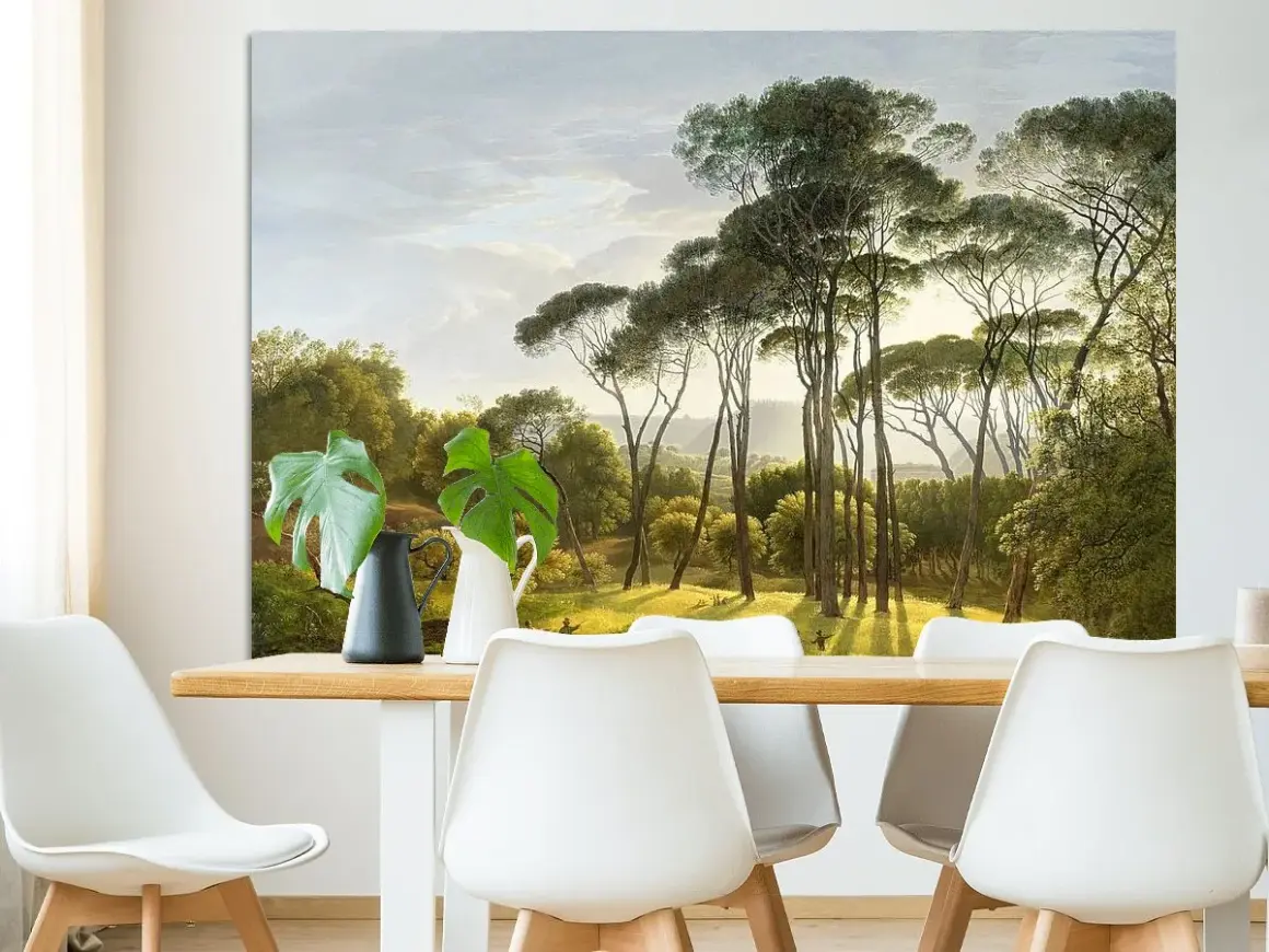 Een schilderij van Hendrik Voogd toont een zonnig landschap met hoge pijnbomen en weelderig groen.