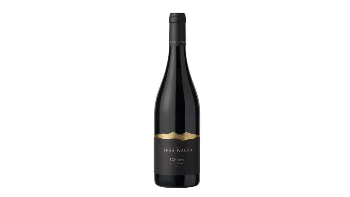 Bottiglia di vino Schiava Elena Walch, con etichetta nera e oro che raffigura montagne. Le caratteristiche di questo vino sono uniche.