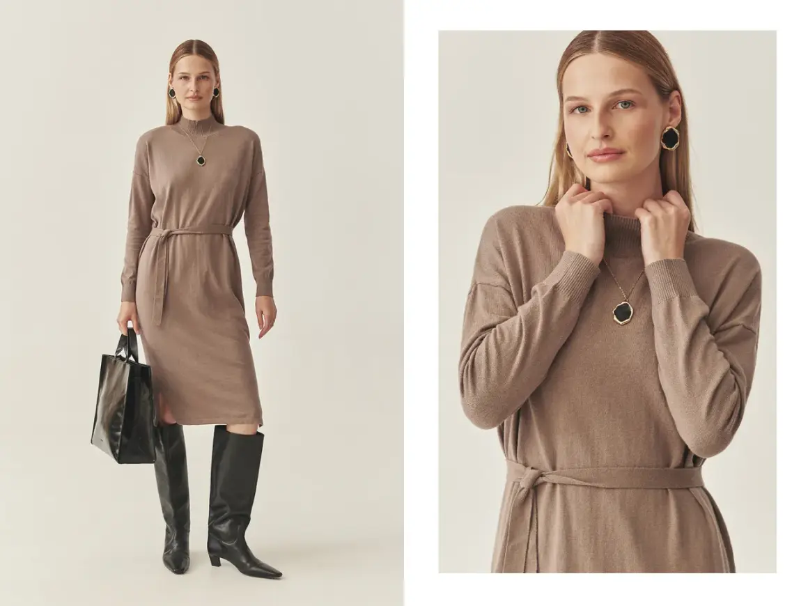 Elegancka, beżowa sukienka boho z paskiem, idealna na jesienne stylizacje. Modelka prezentuje ją z wysokimi kozakami i czarną torebką.