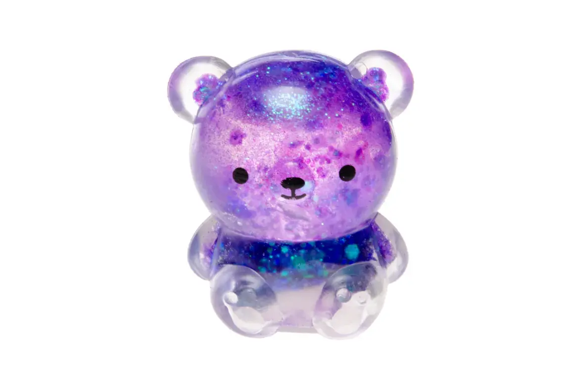 Uroczy, fioletowy gniotek squishy w kształcie misia z brokatem.