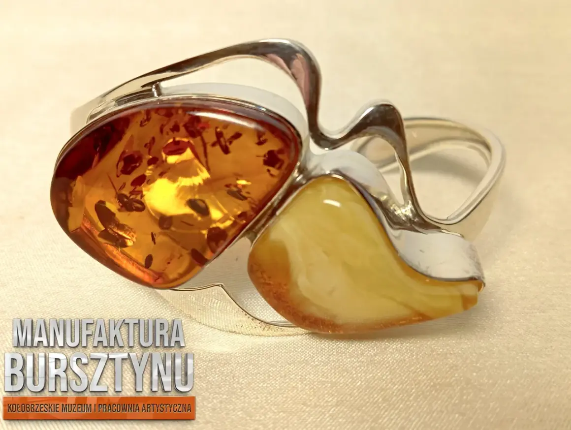 Elegancka bransoletka z bursztynu, której działanie uspokaja i dodaje energii. Srebro pięknie komponuje się z ciepłymi barwami kamienia.