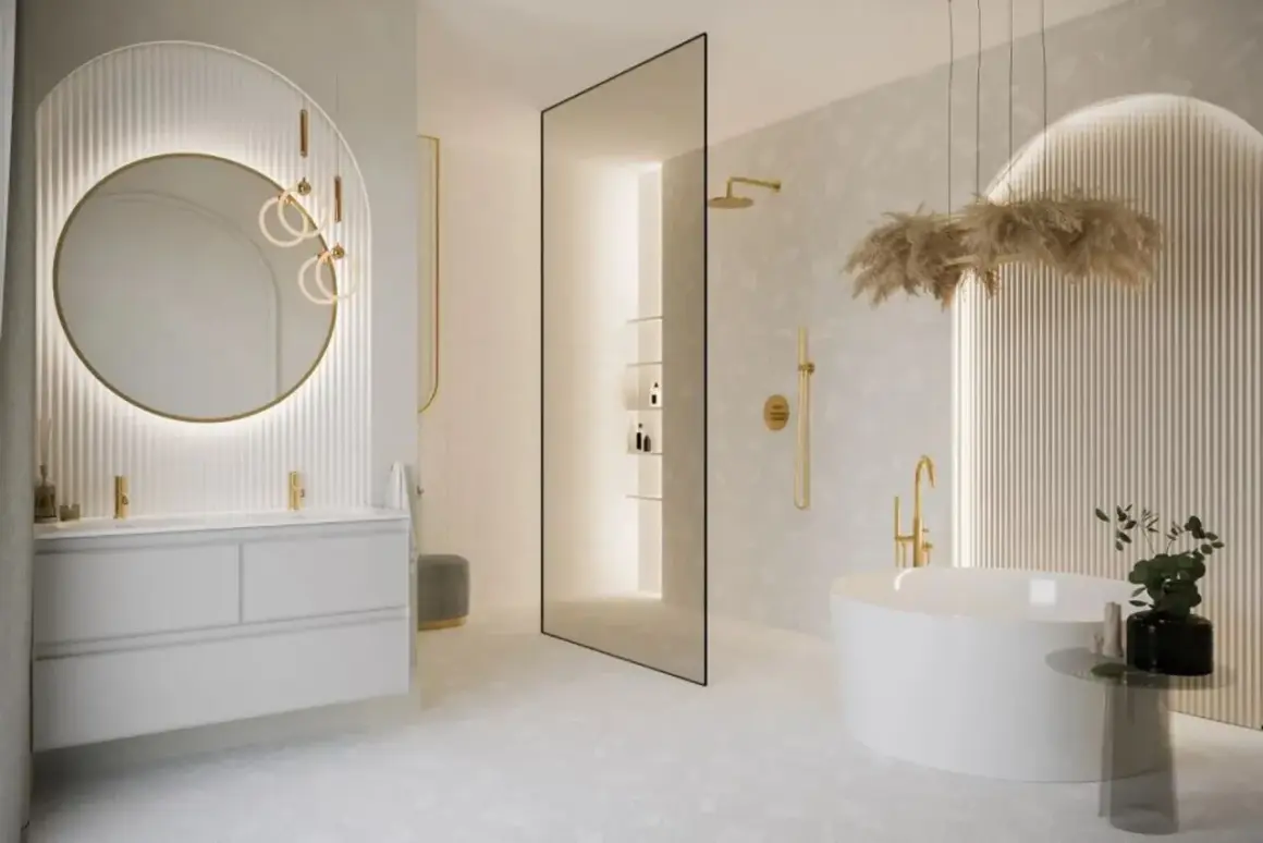 Nowoczesna łazienka z wolnostojącą wanną i podwójną umywalką. Złote baterie i dekoracje dodają elegancji. Idealna inspiracja, jaka umywalka do łazienki.