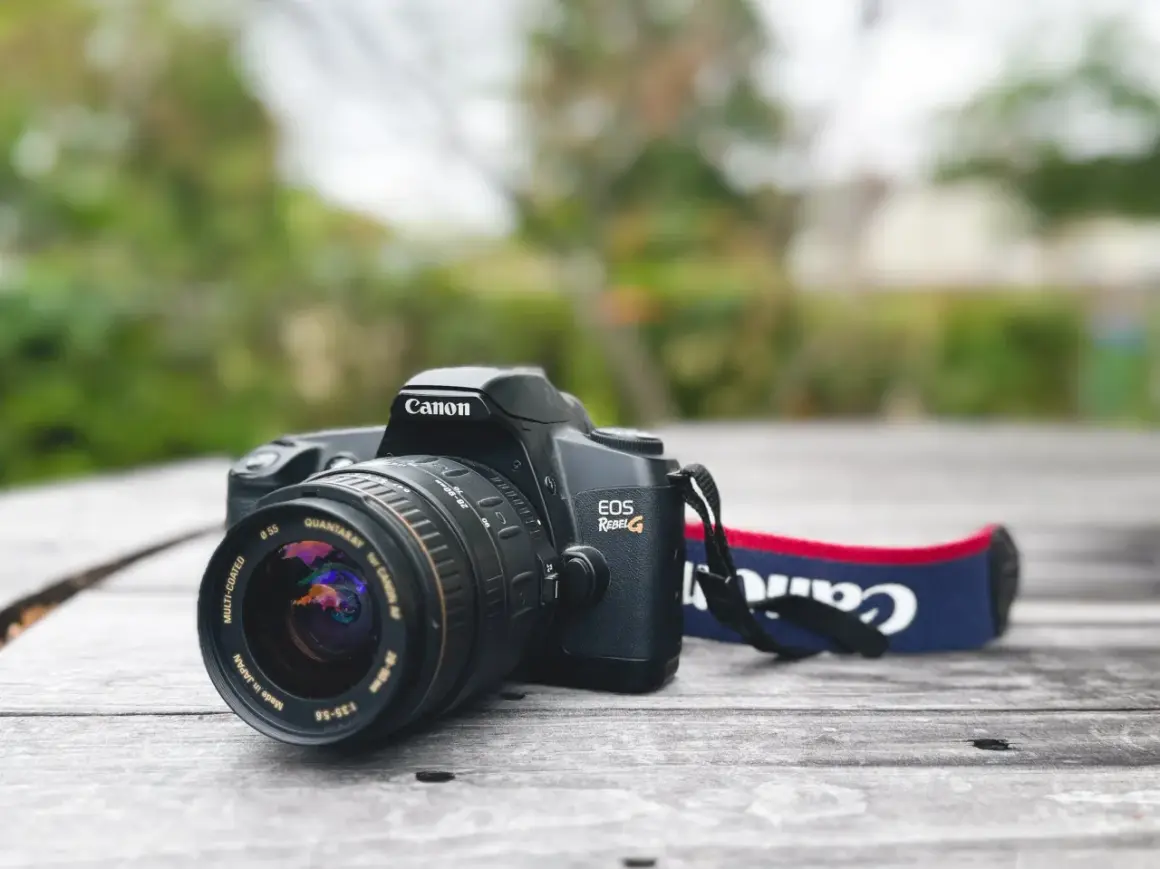 Canon EOS Rebel G film camera with a Quantaray 28-90mm lens, a classic choice for the best Canon 35mm film camera experience.