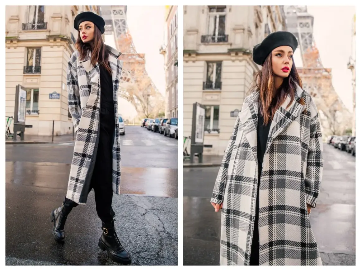Elegancki płaszczyk plus size w kratę, idealny na paryski spacer. Kobieta w beretce i długim płaszczu na tle Wieży Eiffla.