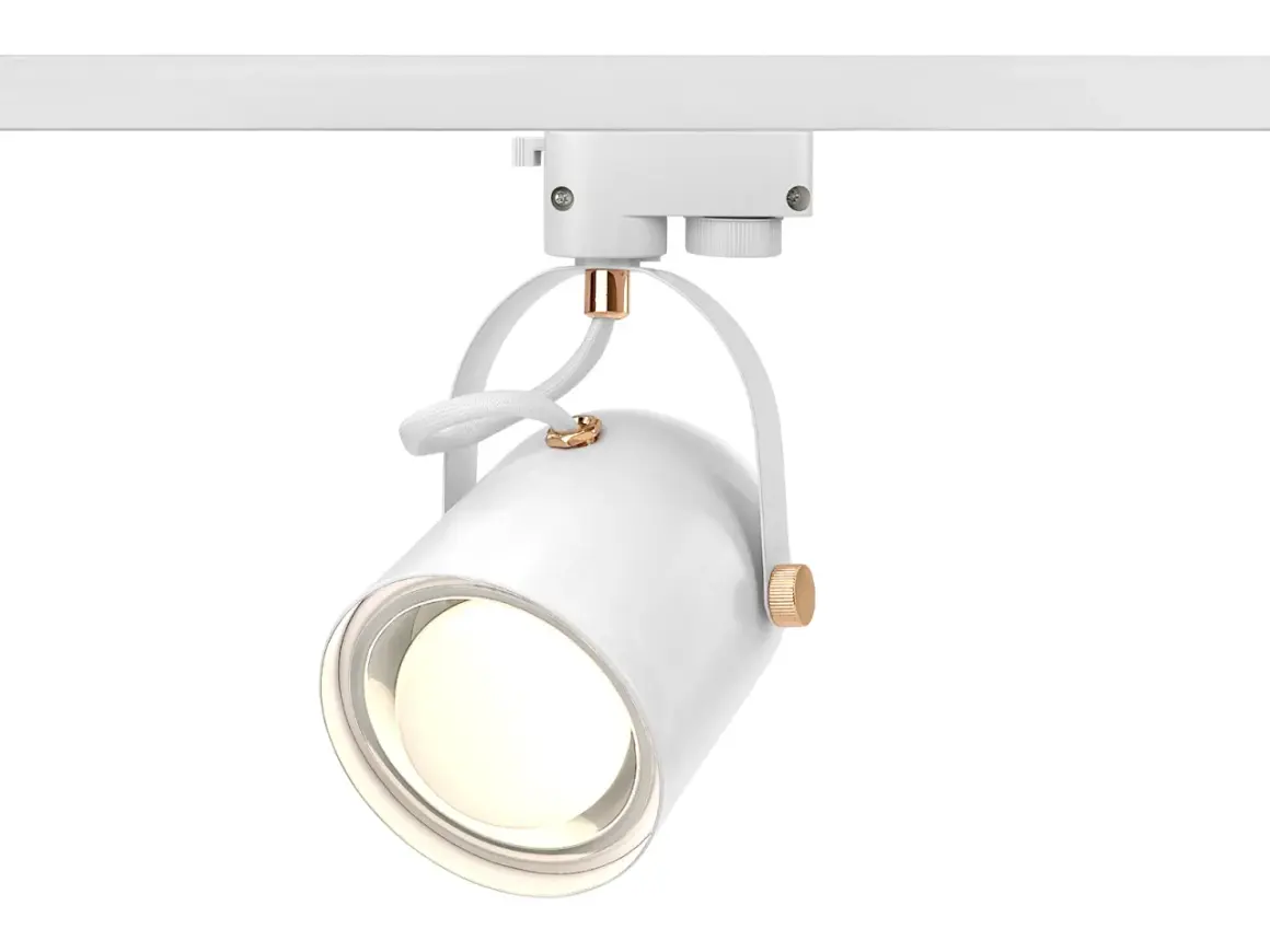 Nowoczesna lampa e27 na szynie, biała z miedzianymi detalami, idealna do podkreślenia każdego zakątka.