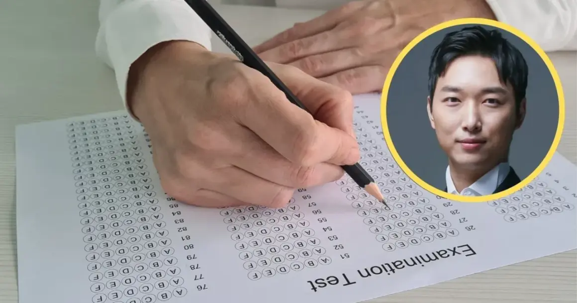 Ręka pisze test, a obok zdjęcie mężczyzny. Czy to on wie, ile iq ma najmądrzejszy człowiek na świecie?