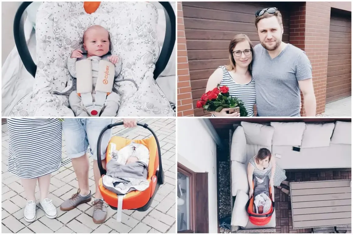 Szczęśliwy wyjście ze szpitala z noworodkiem. Rodzice z bukietem róż i maleństwem w foteliku samochodowym.