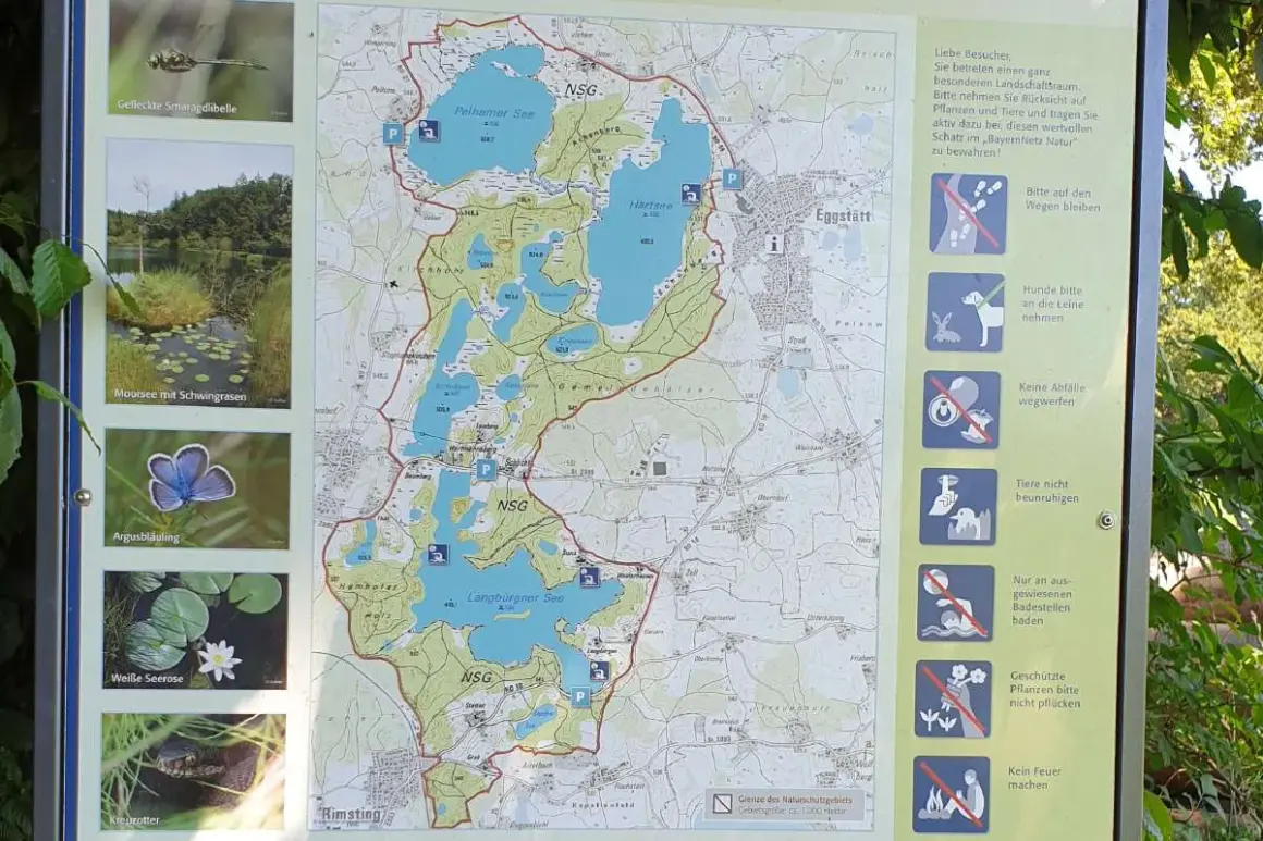 Karte des Naturschutzgebiets mit 16 Seen, darunter Pelhamer See und Langbürgner See. Informationen zu Flora und Fauna.
