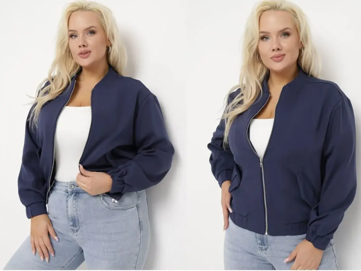 Kobieta plus size w granatowej kurtce bomberce, idealnej na co dzień.
