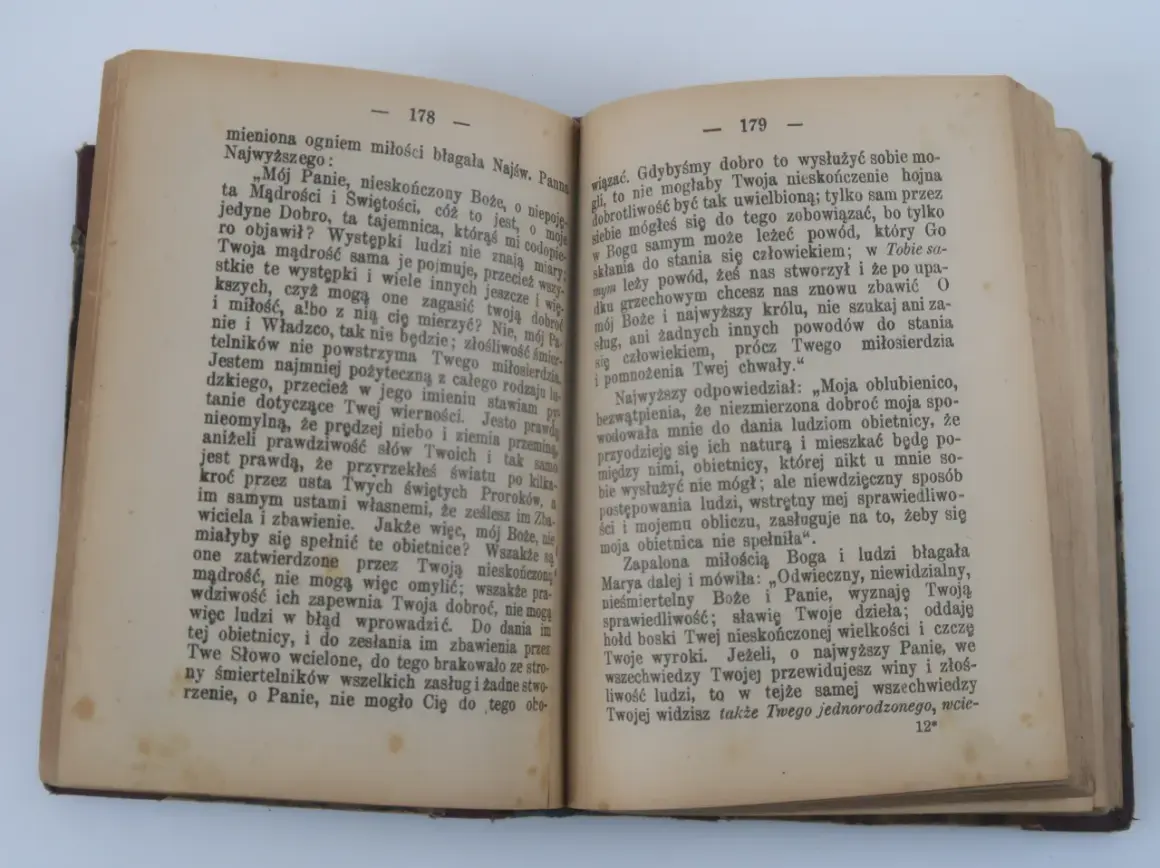 Strony książki z tekstem, w tym fragment o "mistycznym mieście bożym", z numerami 178 i 179.