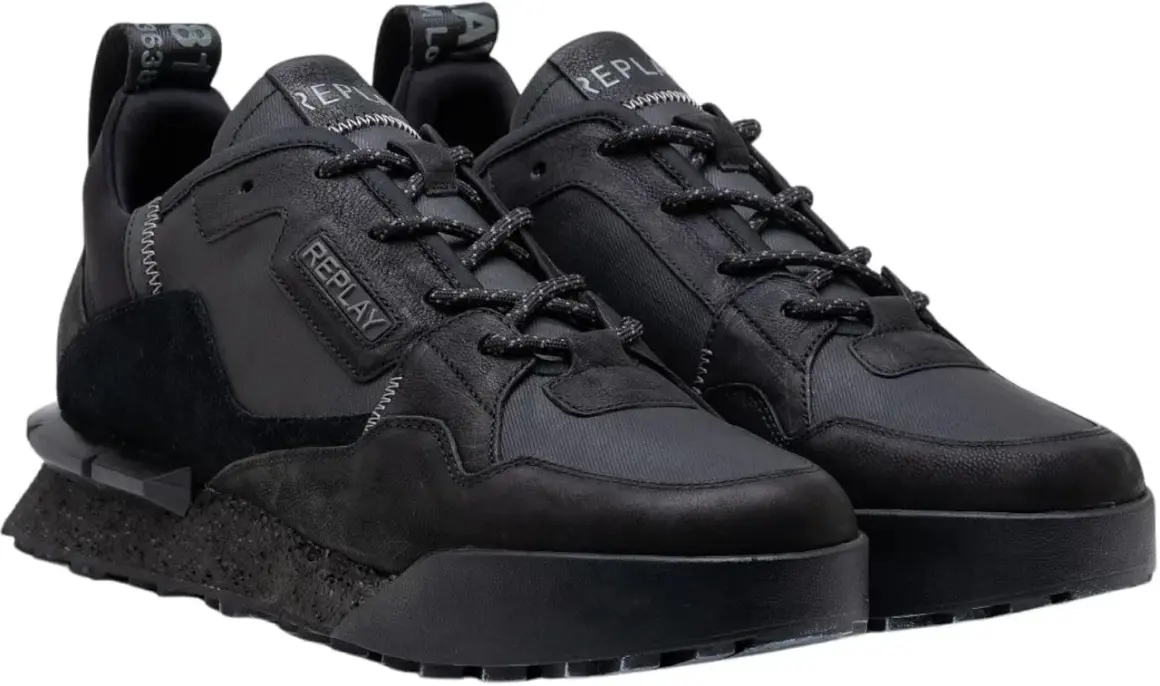 Scarpe Replay uomo nere, in pelle e tessuto tecnico, con suola spessa e dettagli a contrasto. Perfette per un look casual e moderno.