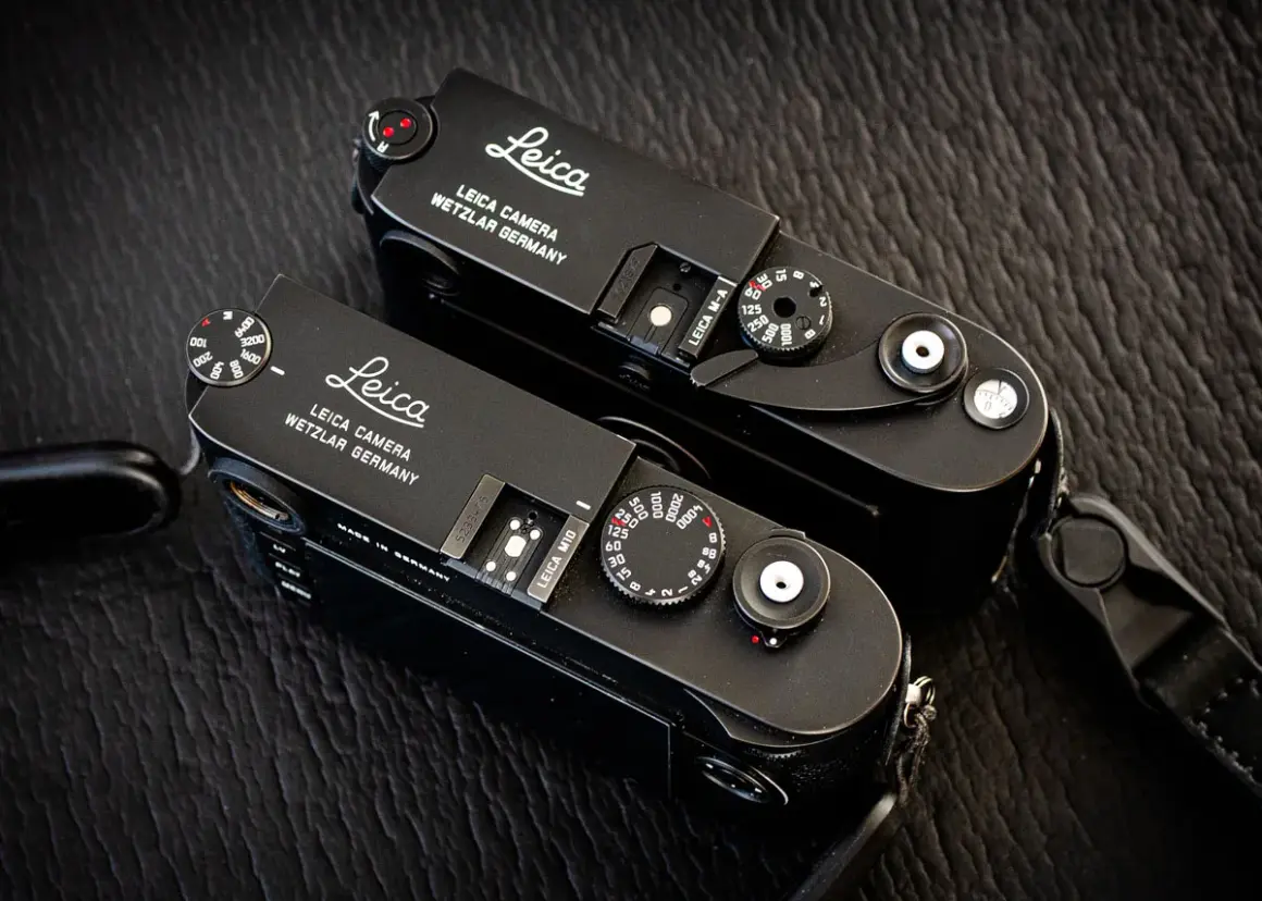 Two black Leica M cameras, ready for detailed Leica lenses reviews.