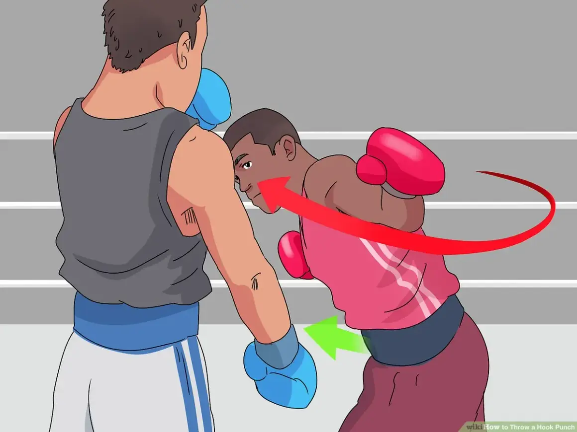 Boxer in red throws a powerful hook punch, aiming for his opponent's head. The red arrow shows the arc of the throw.