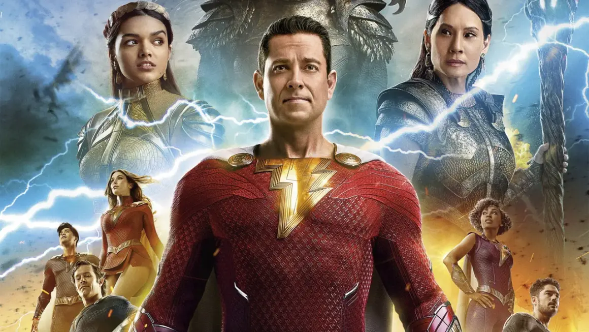 Shazam! Gniew bogów: obsada filmu z superbohaterami w strojach, otoczona błyskawicami.