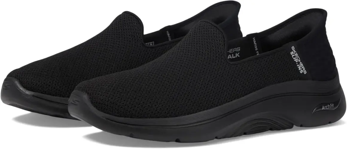 Zapatillas negras Skechers Arch Fit 2.0, cómodas y fáciles de poner, ideales para caminar.