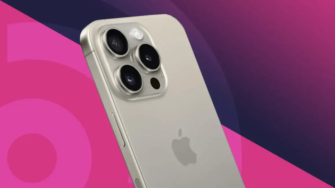 Close-up of a silver iPhone's rear camera array with three lenses and a flash, against a pink and purple gradient background.