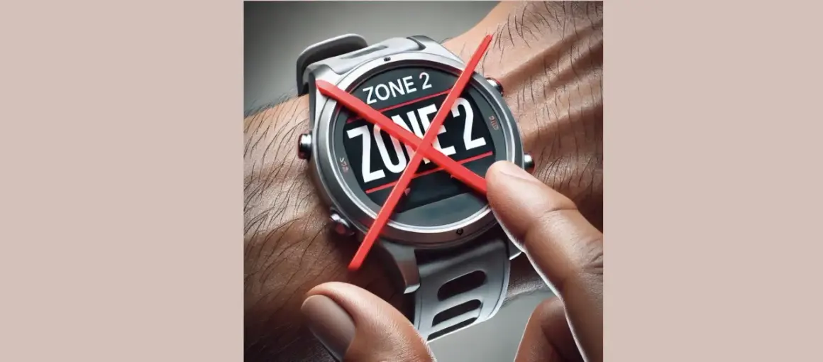 Montre connectée affichant "ZONE 2" barré de rouge. Fin de l'entraînement en zone 2.
