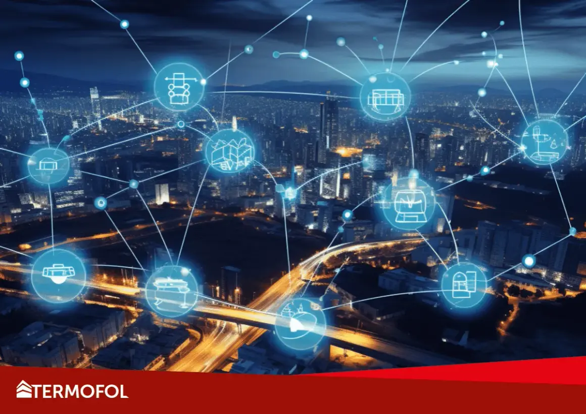 Sieć połączonych ikon symbolizuje smart grid, integrujący infrastrukturę miejską i przemysłową.