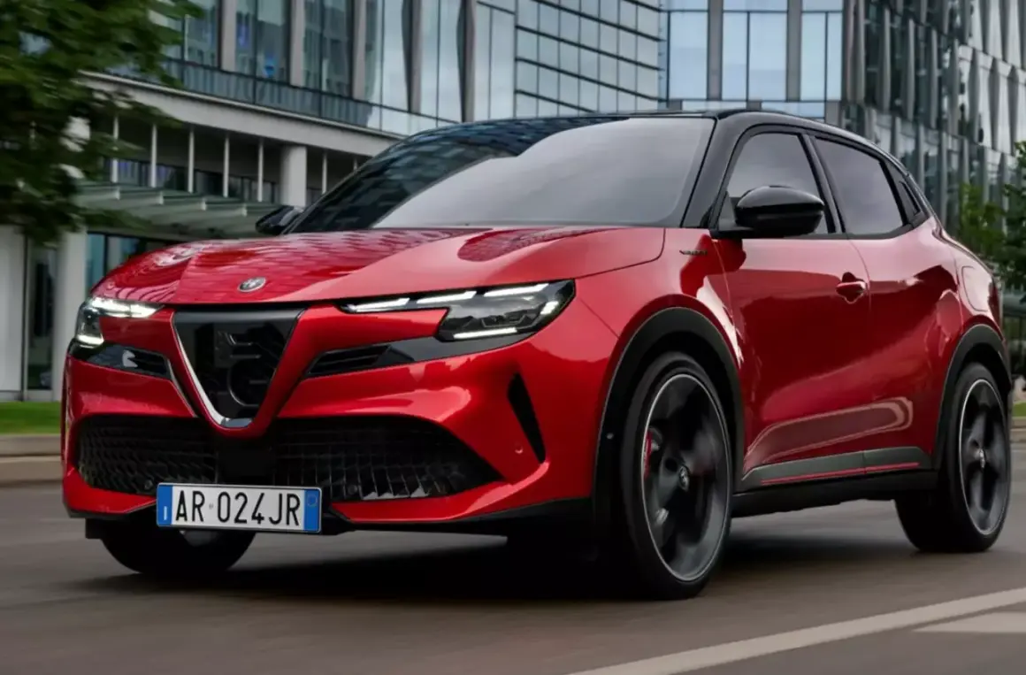 Czerwony SUV Alfa Romeo pędzi ulicą. Jaki suv, taki styl!
