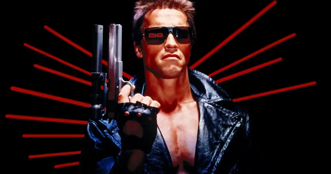 Arnold Schwarzenegger jako T-800, ikona z obsady Terminatora, z pistoletem i czerwonymi promieniami w tle.