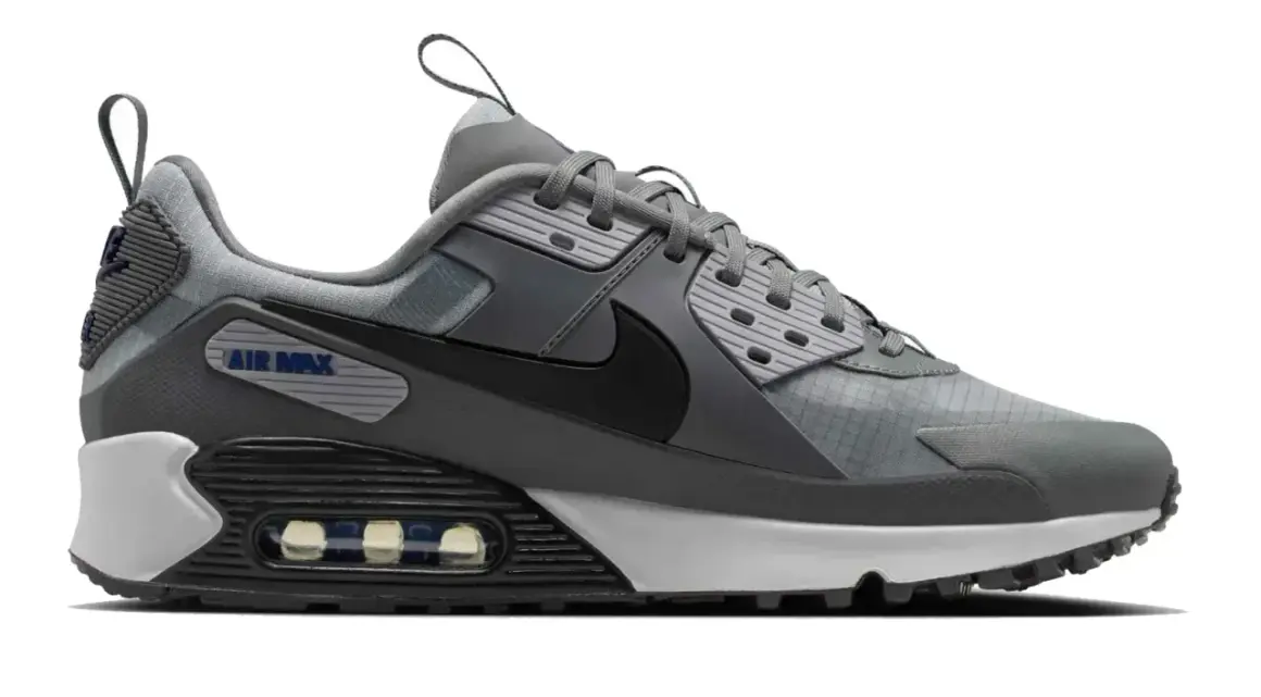 Szary but sportowy Nike Air Max Light z czarnym logo i widoczną poduszką powietrzną.
