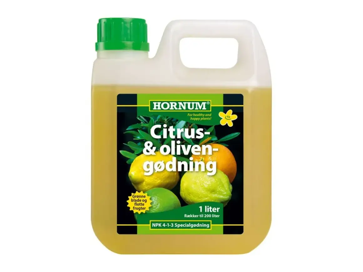 En flaska med citrusnäring från Hornum, med bilder på citroner och apelsiner. Ger friska blad och fina frukter.