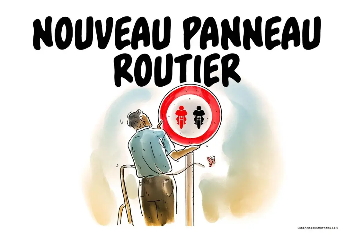 Un homme installe un nouveau panneau routier interdisant les motocyclettes et cyclomoteurs.