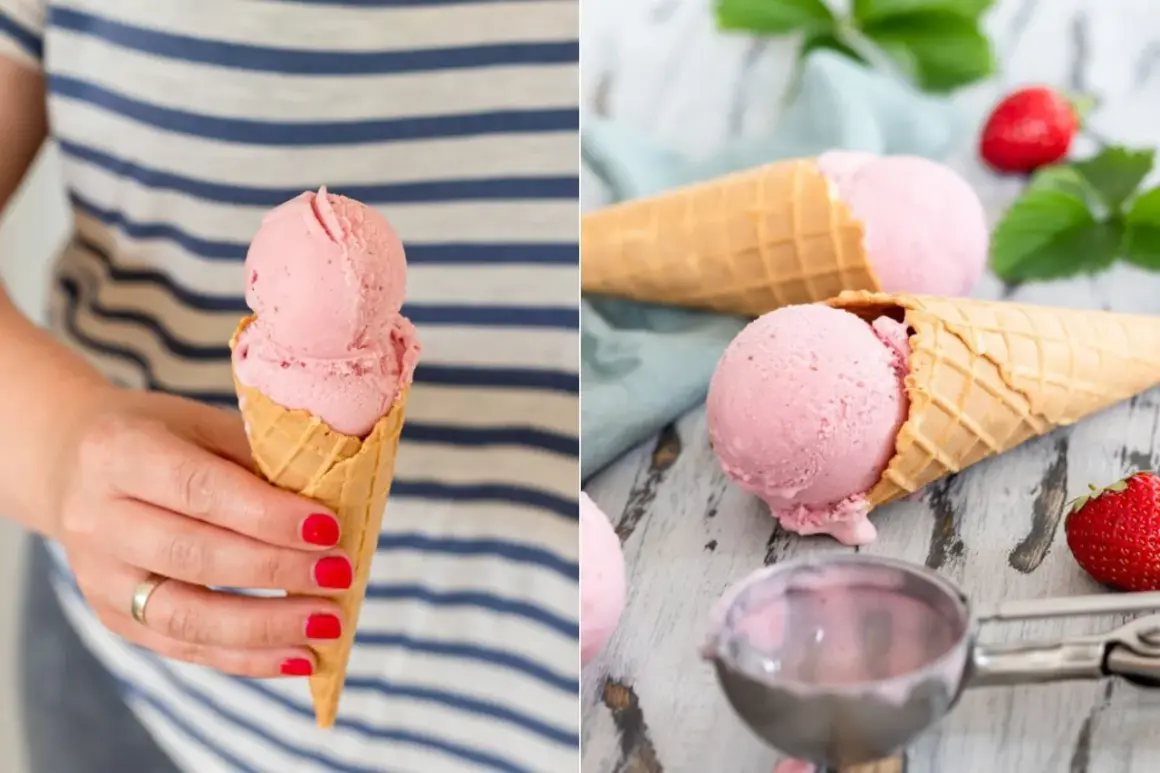 Zwei Eiswaffeln mit cremigem, rosa Erdbeereis vegan. Eine Hand hält eine Waffel, daneben liegen frische Erdbeeren.