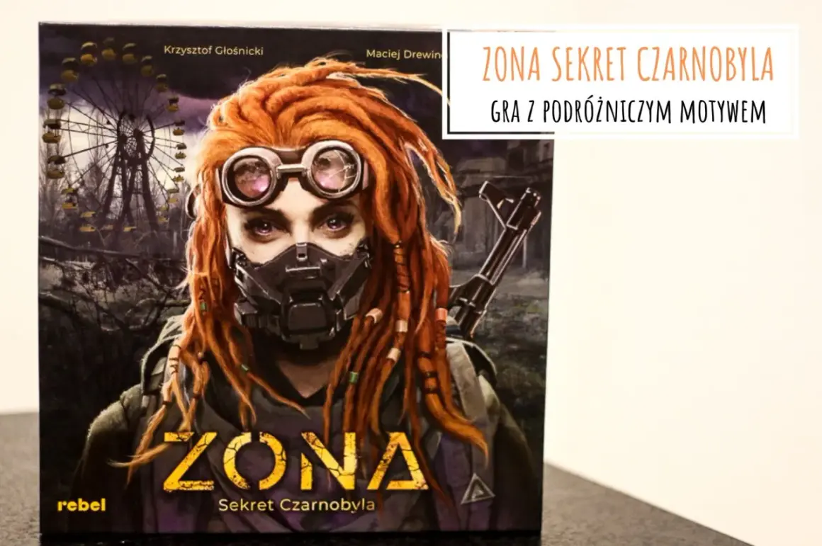 ZONA: Sekret Czarnobyla – gra planszowa z podróżniczym motywem. Postać z rudymi dredami, goglami i maską ochronną, na tle zrujnowanego diabelskiego młyna.