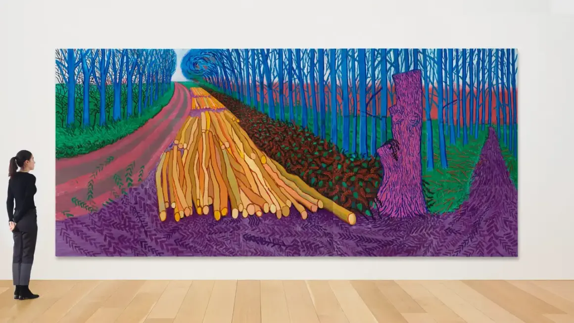 A contemporary landscape painting depicts a vibrant forest scene with a winding path, stacked logs, and a striking purple tree stump.