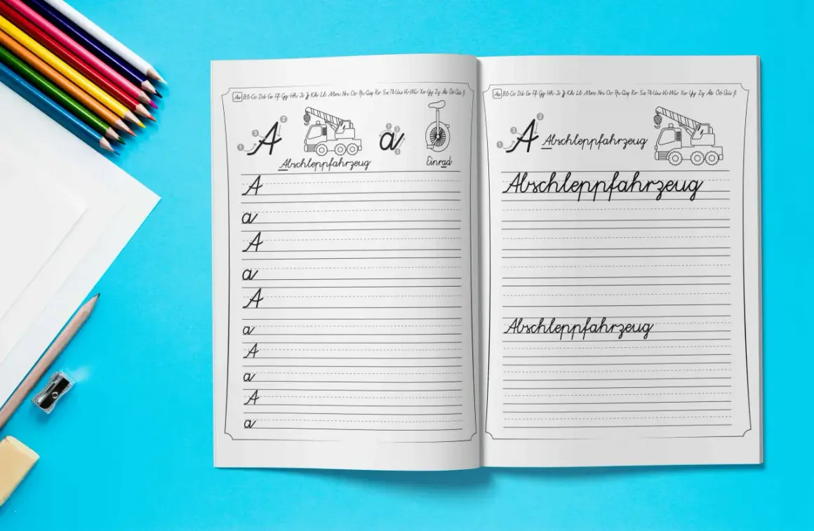 Übungsheft für die vereinfachte schulausgangsschrift mit dem Wort "Abschleppfahrzeug" und dem Buchstaben "A".