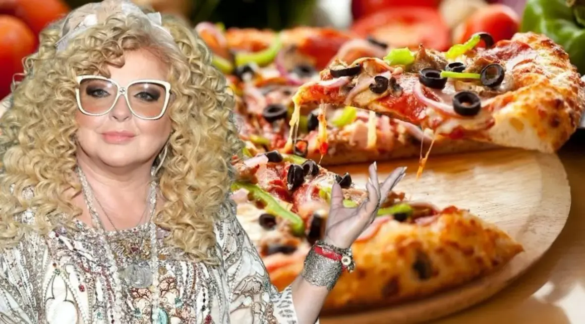 Magda Gessler z pizzą, ser ciągnie się z kawałka.