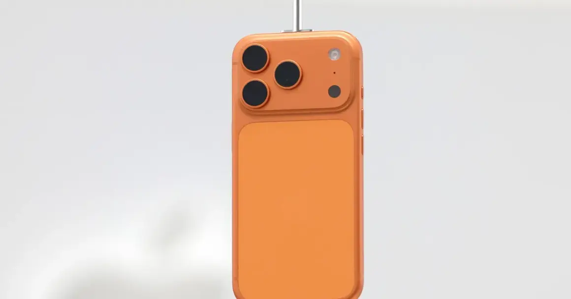 Pomarańczowy iPhone z trzema obiektywami aparatu, wiszący na białym tle. Kiedy premiera iPhone 18?