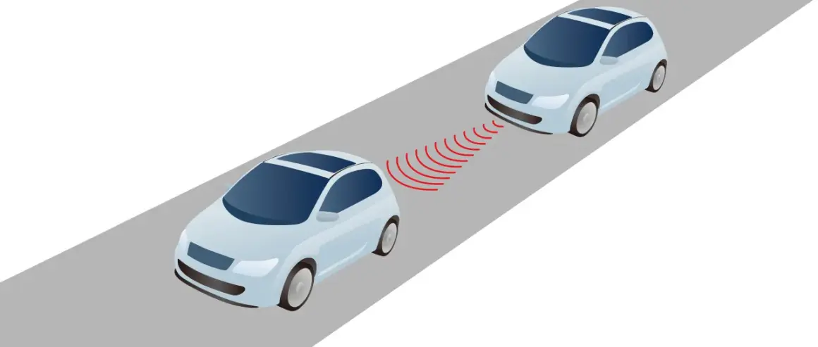 Deux voitures sur une route, la voiture de devant active le frein voiture automatique grâce à des ondes rouges.