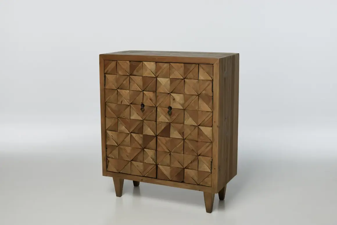 A rustic wooden cabinet with a geometric patterned door, showcasing one of the many types of furniture cabinets available.