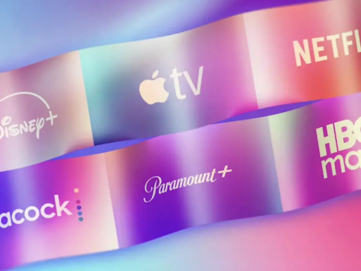 Logos of streaming services like Disney+, Apple TV, Netflix, Peacock, Paramount+, and HBO Max are displayed on colorful, wavy ribbons, showcasing the variety of what is online video.
