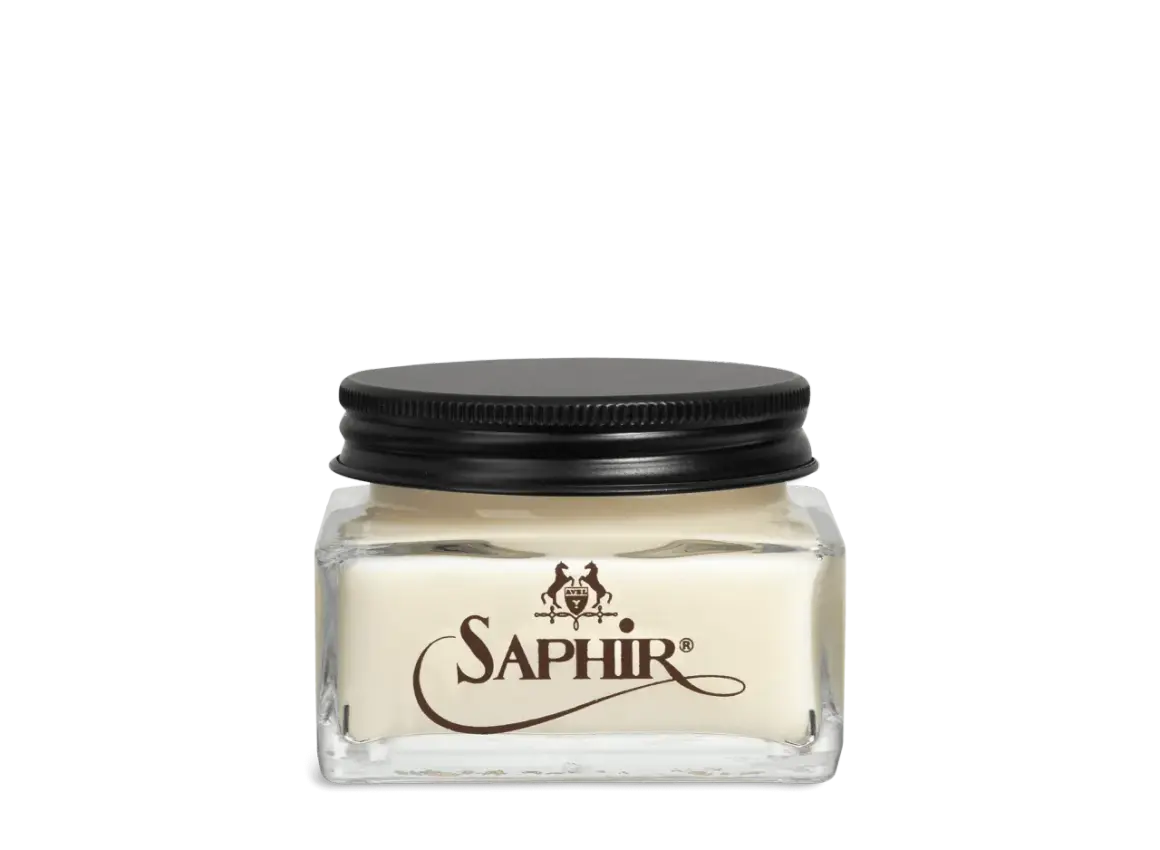 Crème pour le cuir napa Saphir dans un pot en verre avec un couvercle noir.