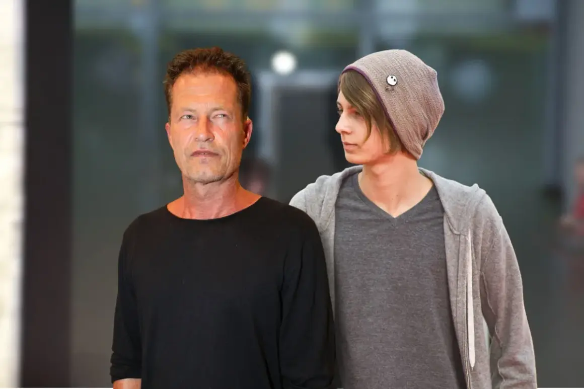 Valentin Florian Schweiger und ein junger Mann mit Mütze.