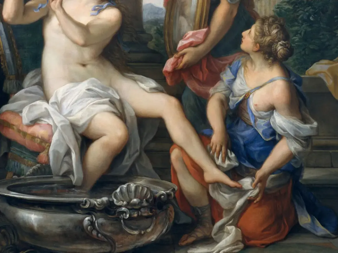 Erotic Renaissance art: A woman bathes, attended by another, in a scene of opulent sensuality.