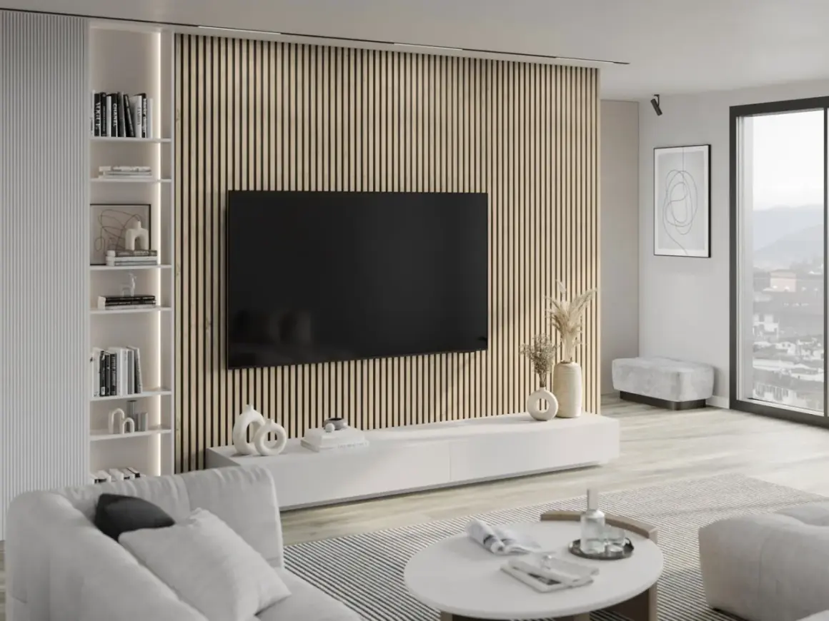 Nowoczesny salon z telewizorem na tle lameli. Z czym łączyć lamele? Z bielą, drewnem i minimalistycznymi dodatkami.