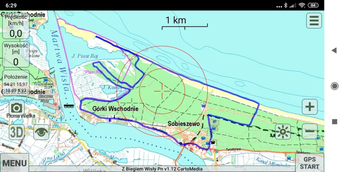 Mapa z zaznaczoną trasą rowerową w Sobieszewie, wzdłuż Martwej Wisły. Widoczna skala 1 km.